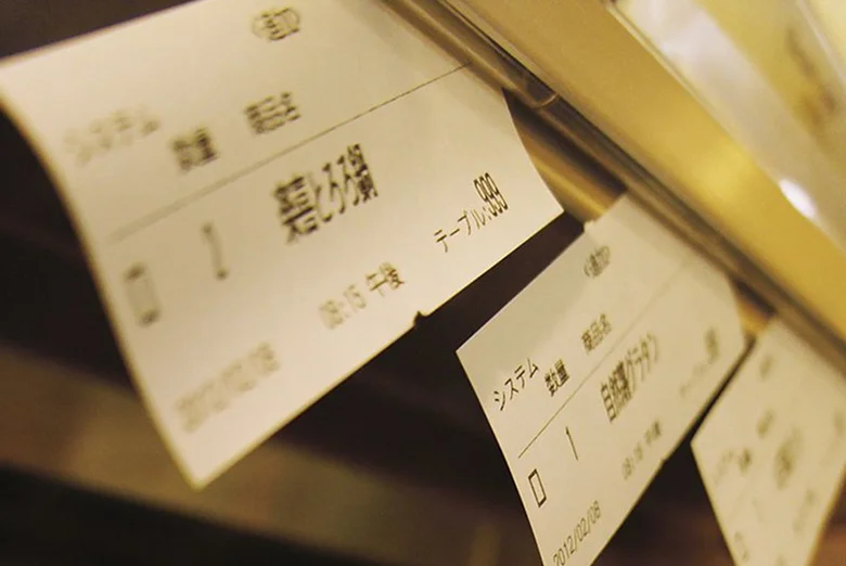 キッチンプリンターから出力された注文伝票の印字見本